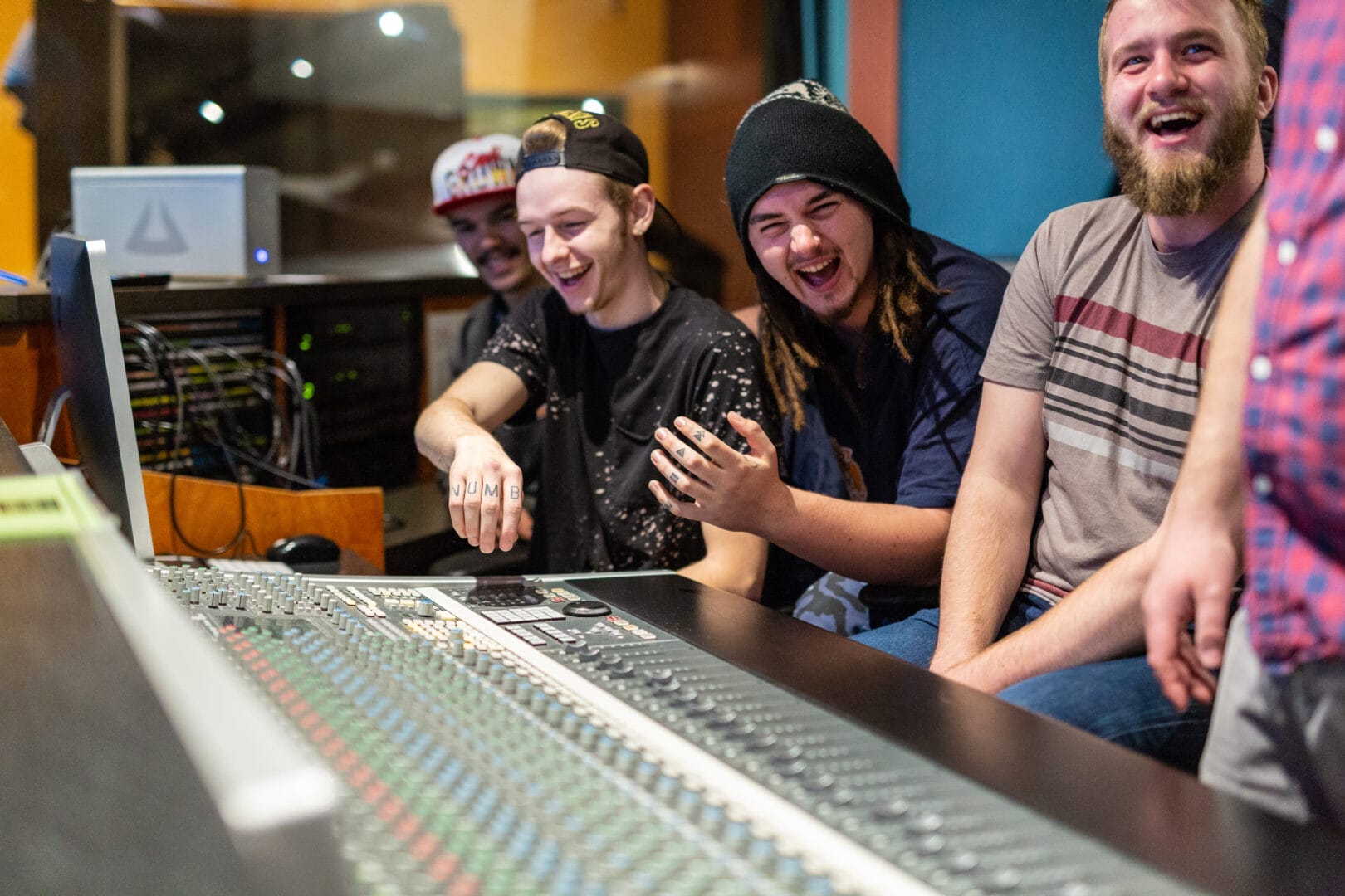 College for Arts and Technology Audio Engineering & Production students enjoying a lesson in the recording studio.