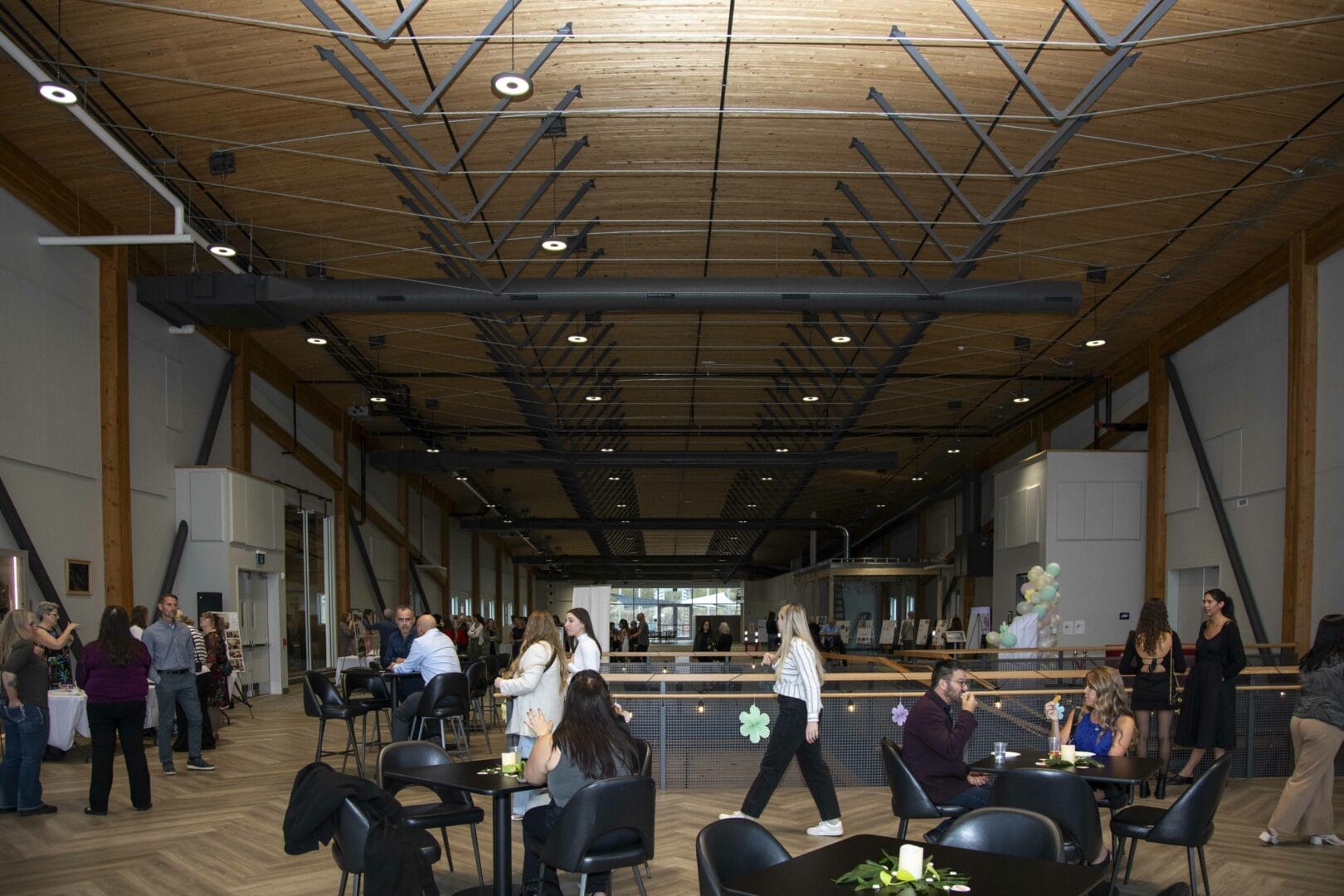 Interior of the venue, KF College for Excellence showing some guests enjoying the space.
