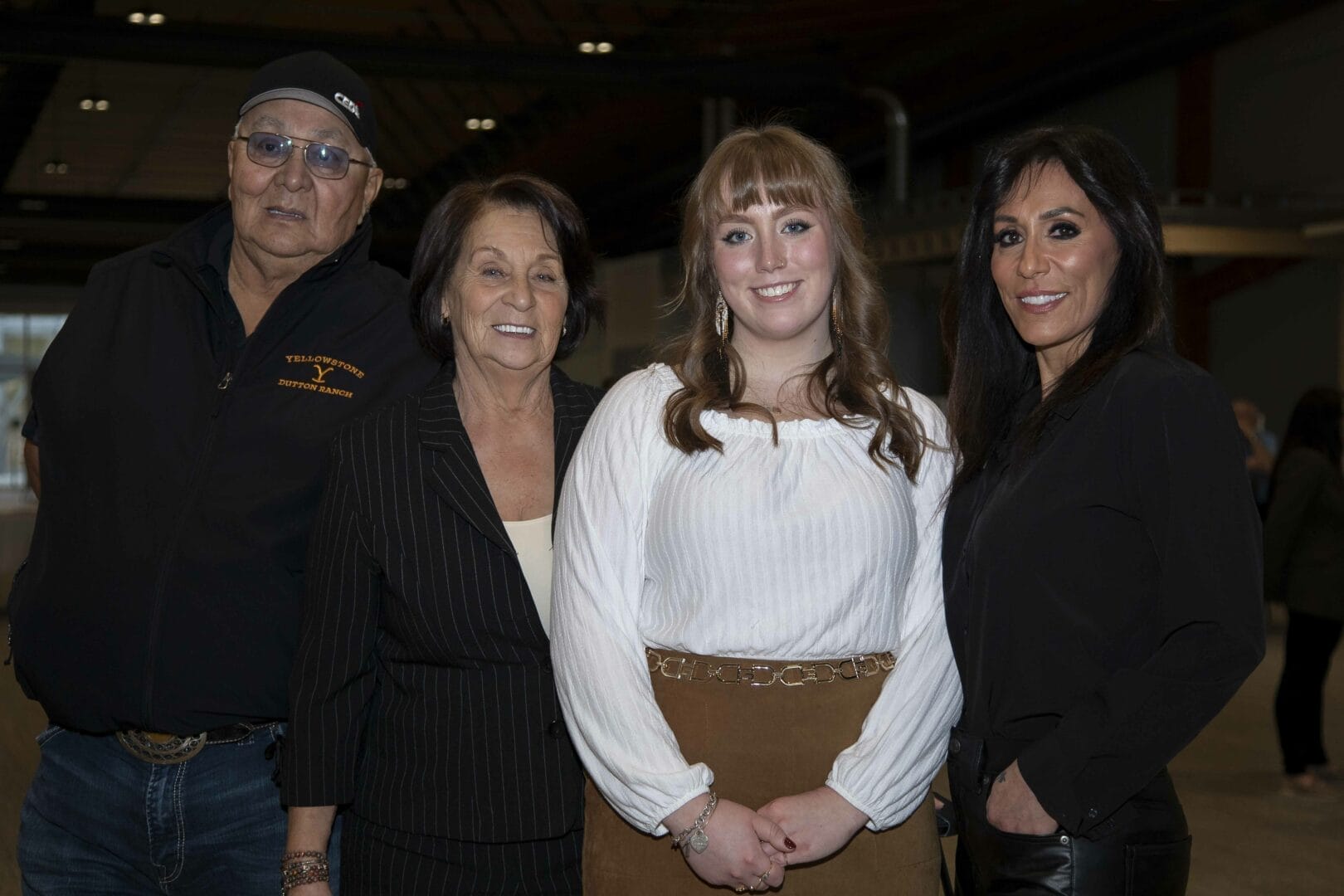 Diploma in Advanced Interior Design & Technology grad, Paiten Sellin poses for a photo with guests.
