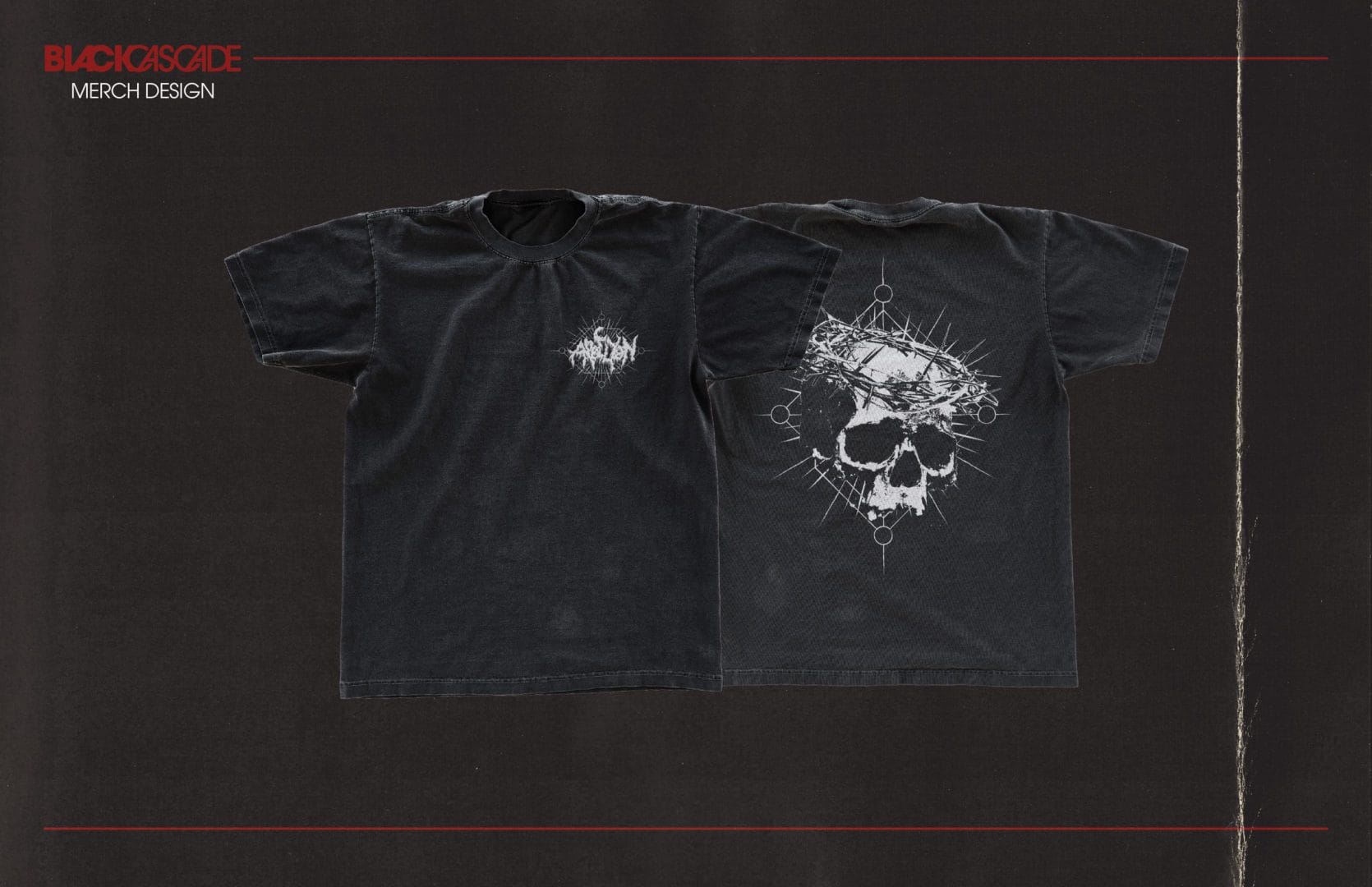 A black t - shirt with a skull on it.